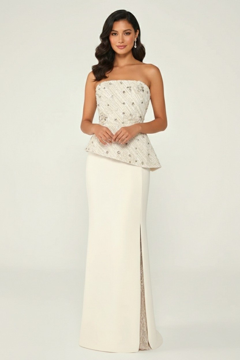 فستان أنيق باللون العاجي بدون أكمام